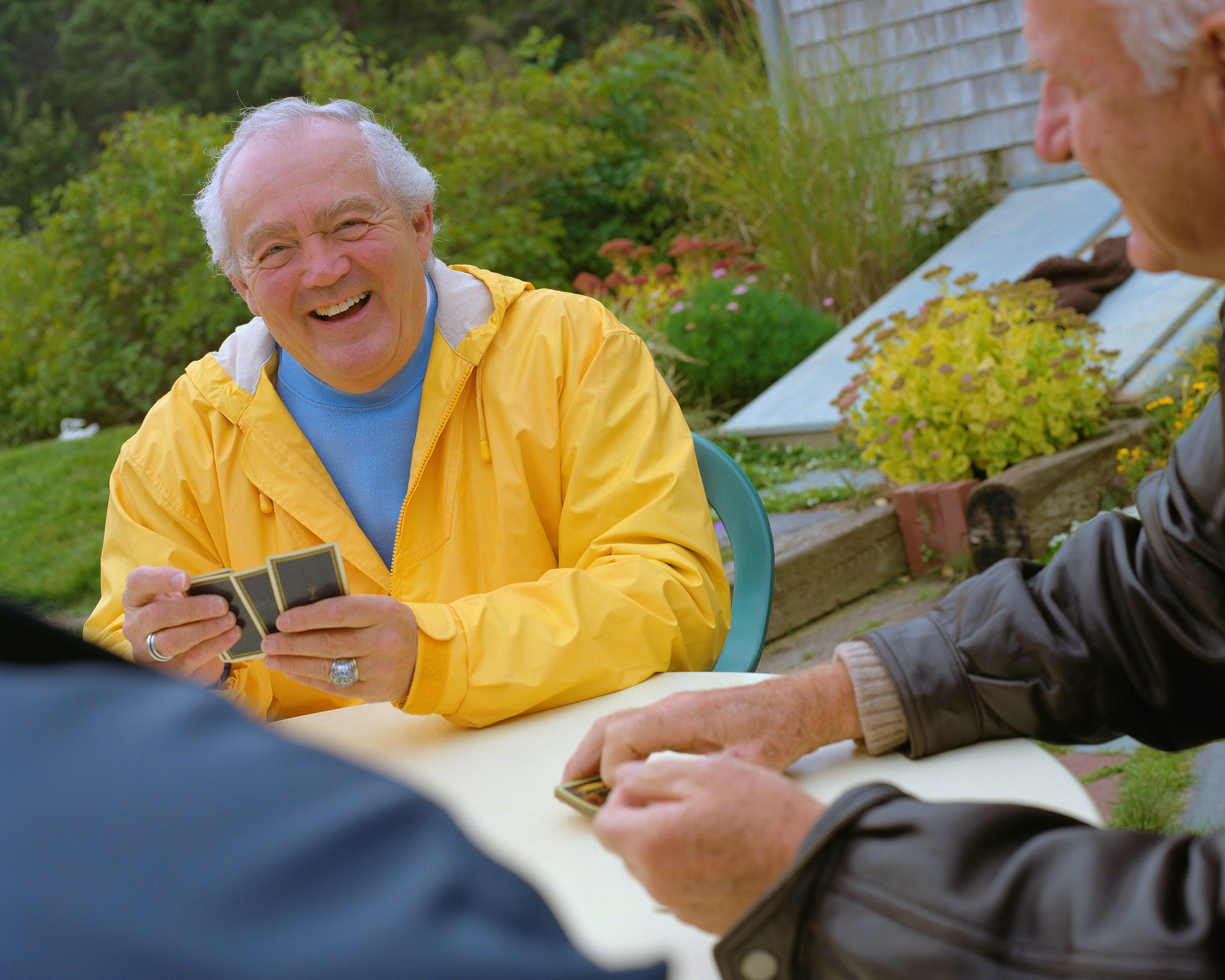 Older men laughing together