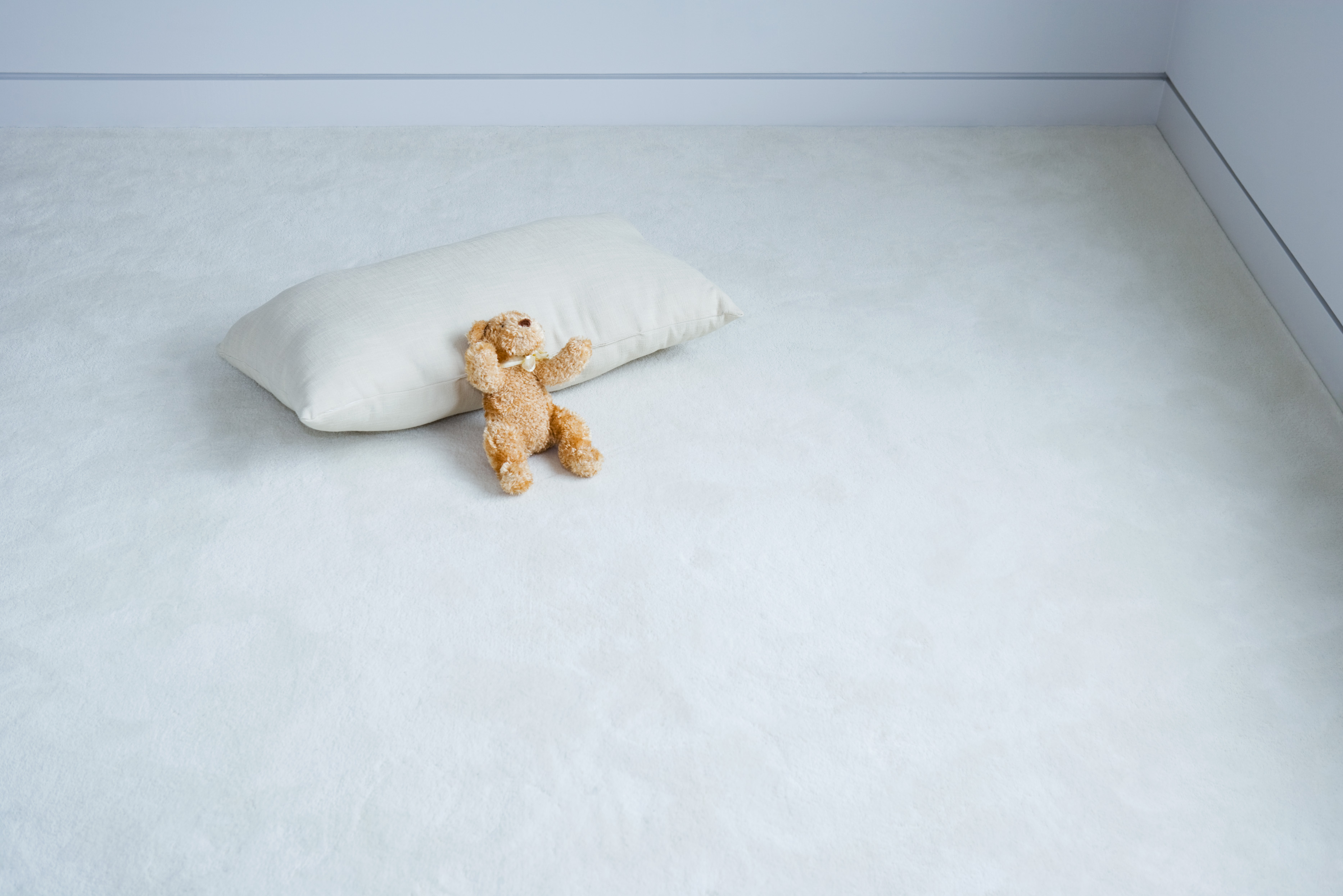 Bilde av bamse på gulvet