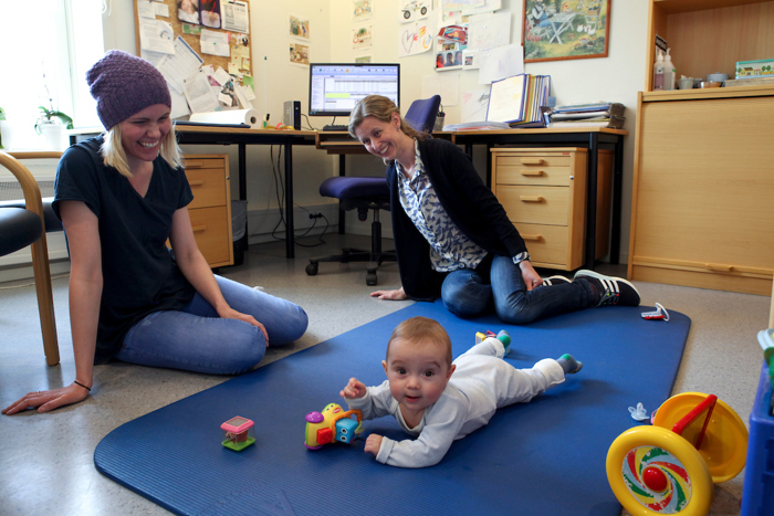 Mother and child with a nurse