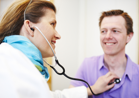 Man getting checked by a doctor 