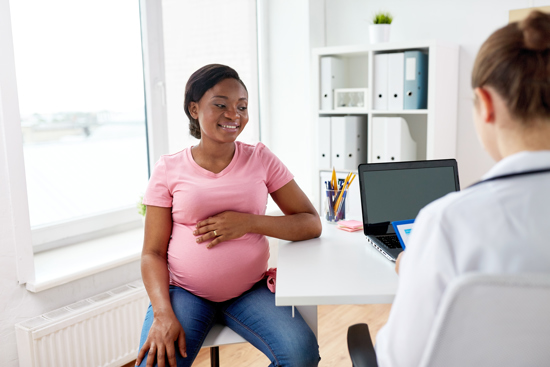 Pregnant woman at the doctor's.