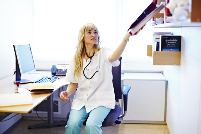 Doctor in her office