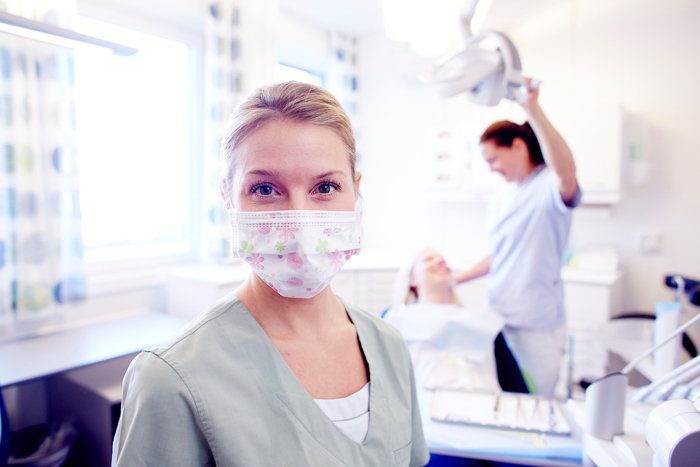 Dentist with face mask