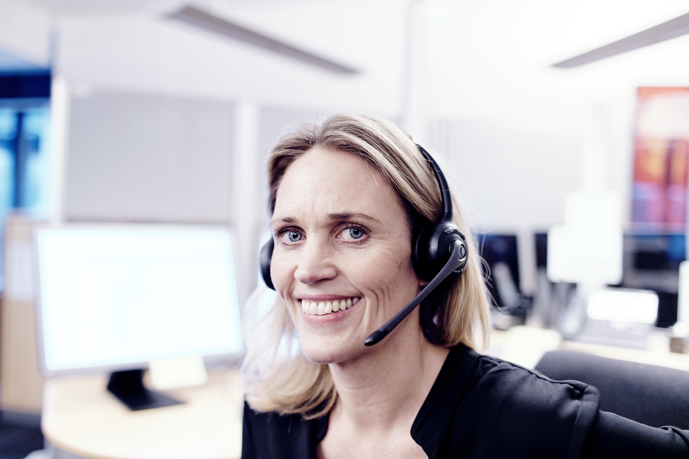 Call center. Woman with headset