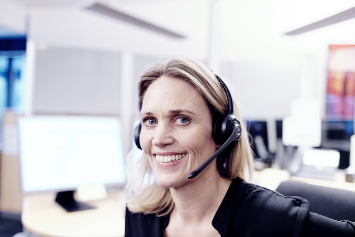 Call center. Woman with headset