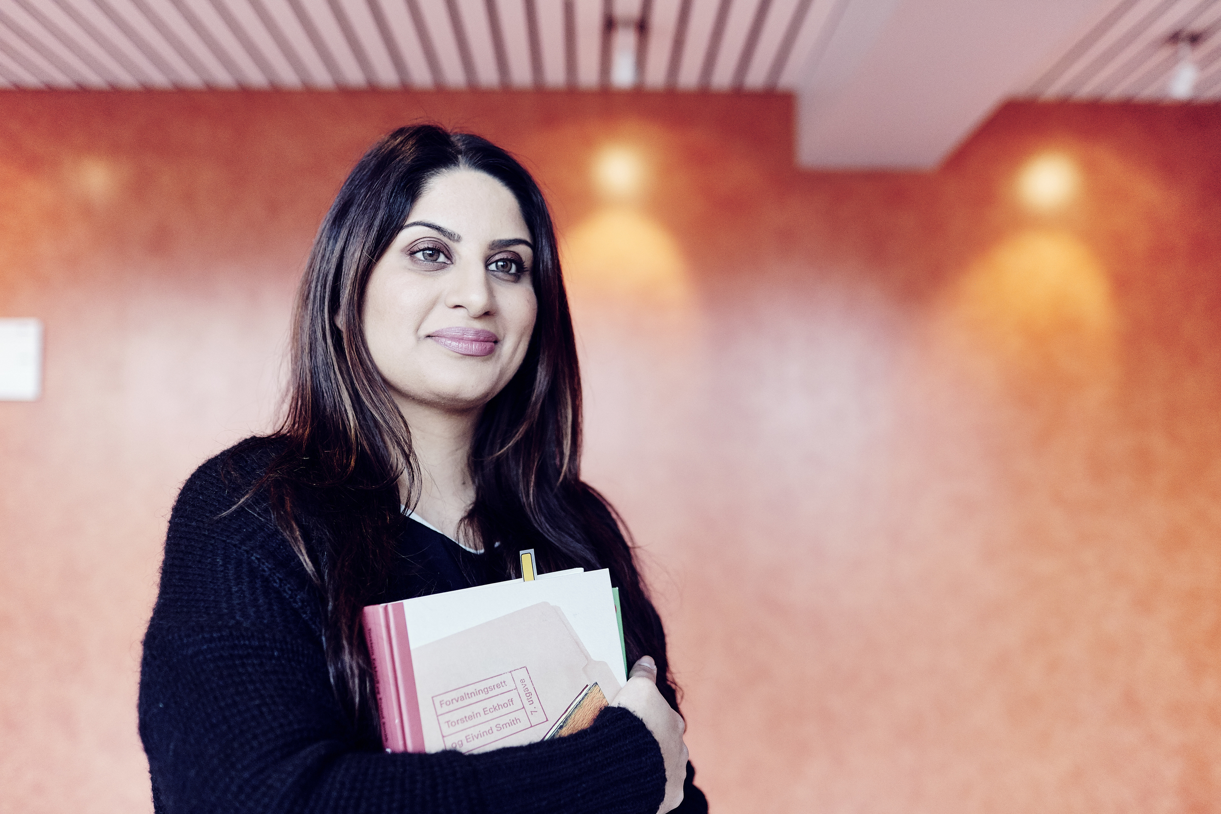 Woman carrying books